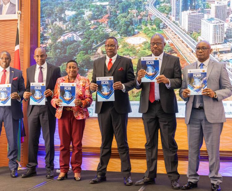 ICT and Digital Economy Cabinet Secretary Mr. Eliud Owalo (third right) with top leadershio of the Authority during the launch of the 5th Corporate Strategic Plan today.