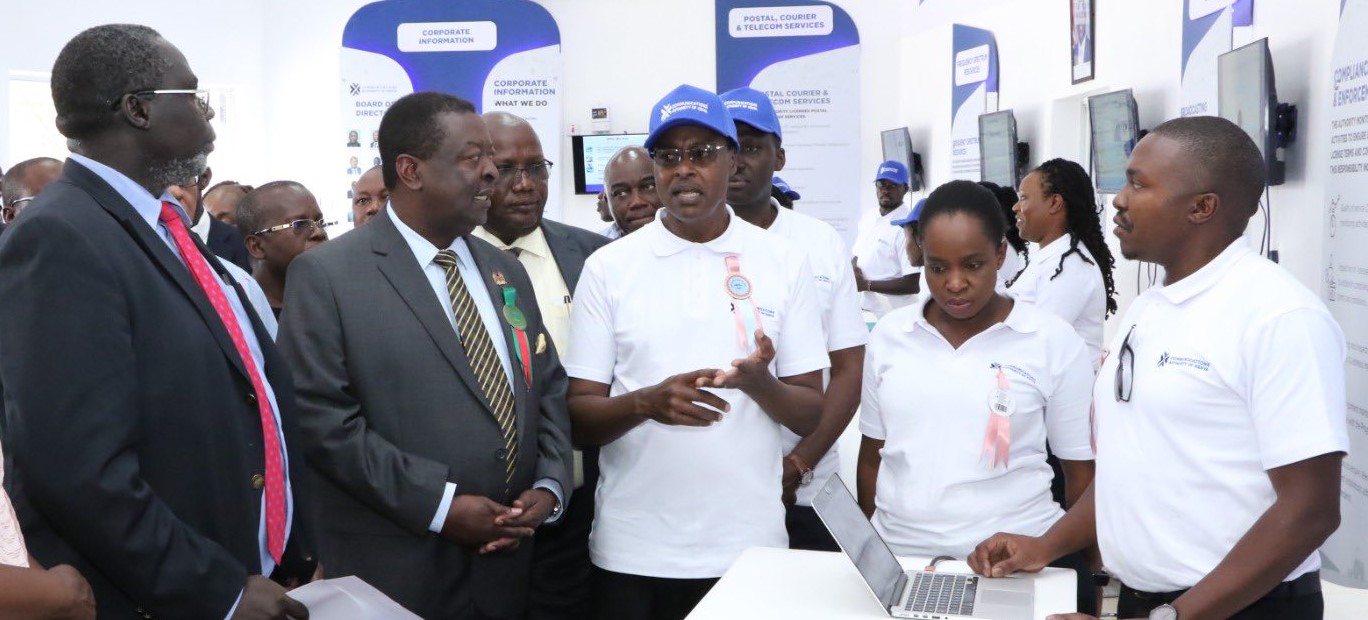 Prime Cabinet Secretary Musalia Mudavadi  (second left) at the CA exhibition stand during the Kisumu Regional Show which ended on Sunday.