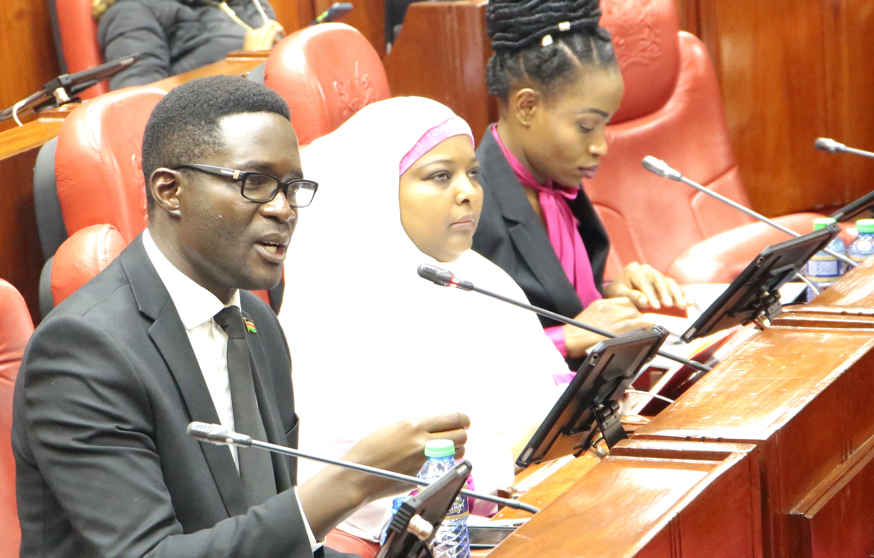 CA Director General Mr. Ezra Chiloba (left) when he appeared before the National Assembly ad hoc committee on the Worldcoin.