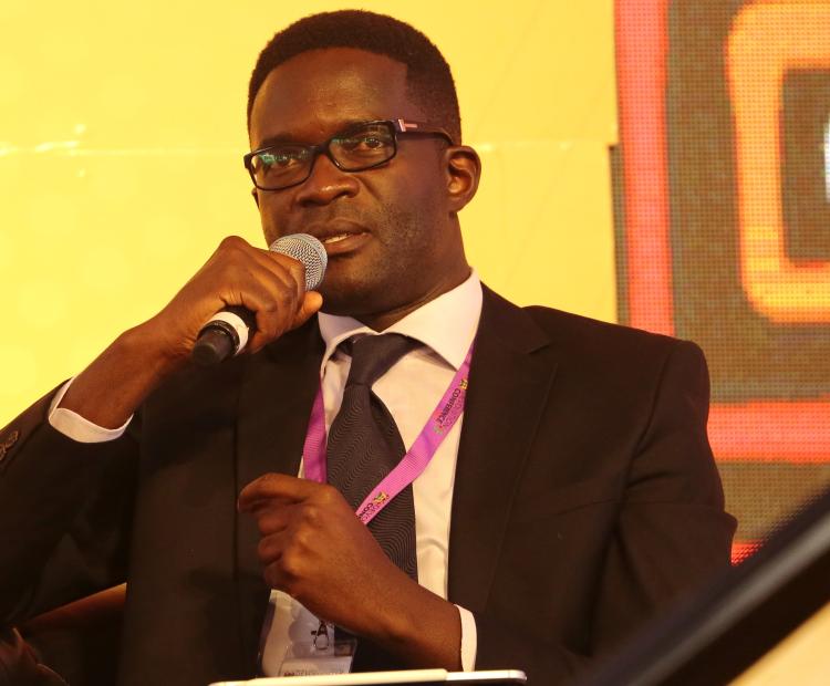 CA Director General Ezra Chiloba speaks during a panel session at the 8th Devolution Conference in Eldoret