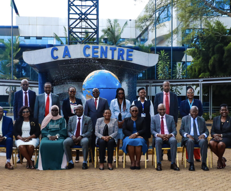 a group photo of the UCC team and CA board during the benchmark visit 