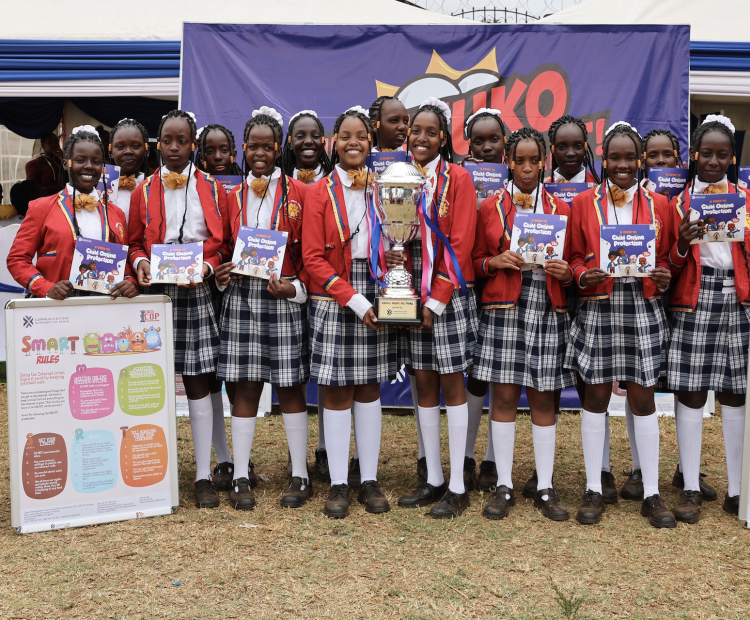 Students from Kagema PCEA proudly display their trophy after emerging top in the CA sponsored category.