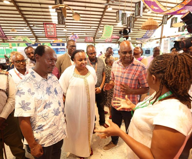 CS Hon. William Kabogo when he visited the CA stand at the Data Ptivacy Conference accompanied by CA Director General Mr. David Mugonyi and Data Commissioner Ms. Immaculate Kassait